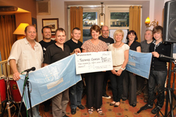 Nick Stubbs with cheque for TCT