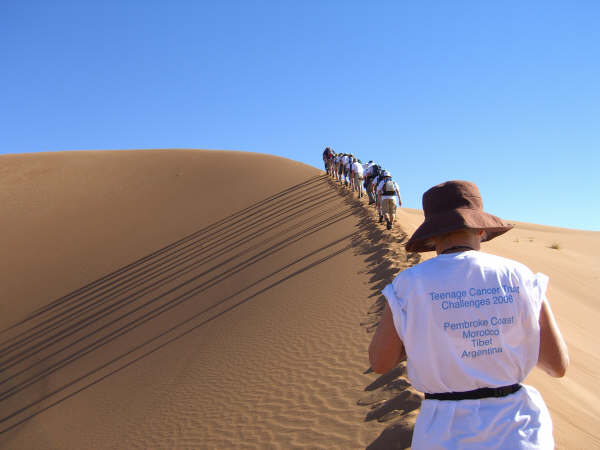 We follow the ridge of sand making impressive shadows